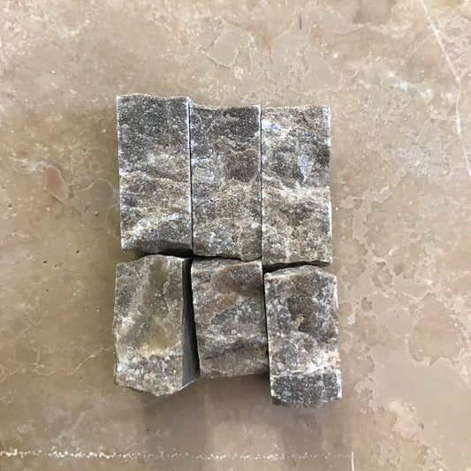 tasselli di marmo grigio emperor dark