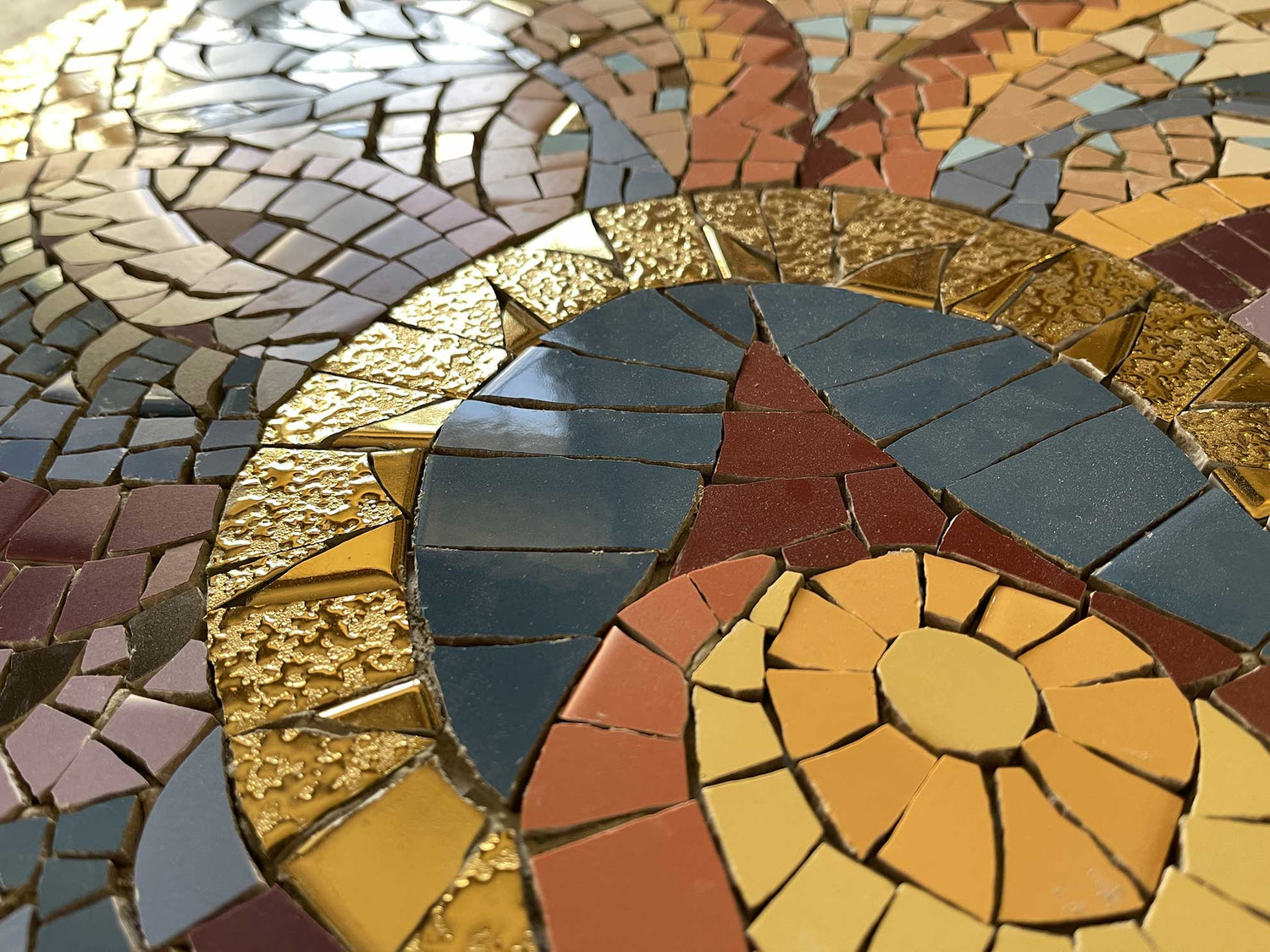 Trencadis mosaic made with ceramic and real gold tiles