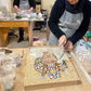 Person working od the creation of the teodora's Portrait Byzantine mosaic
