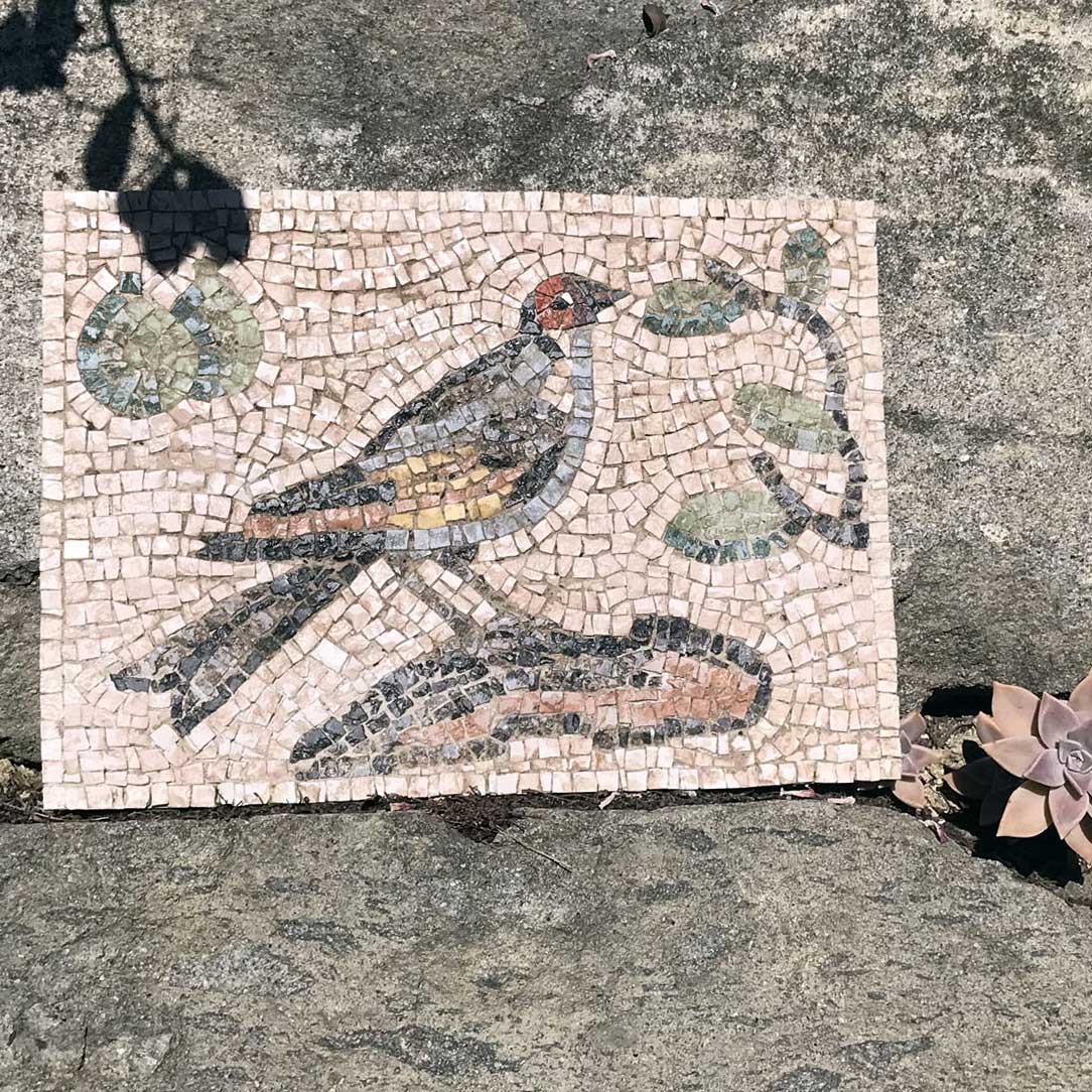 Coloured Roman bird mosaic made with marble tiles.